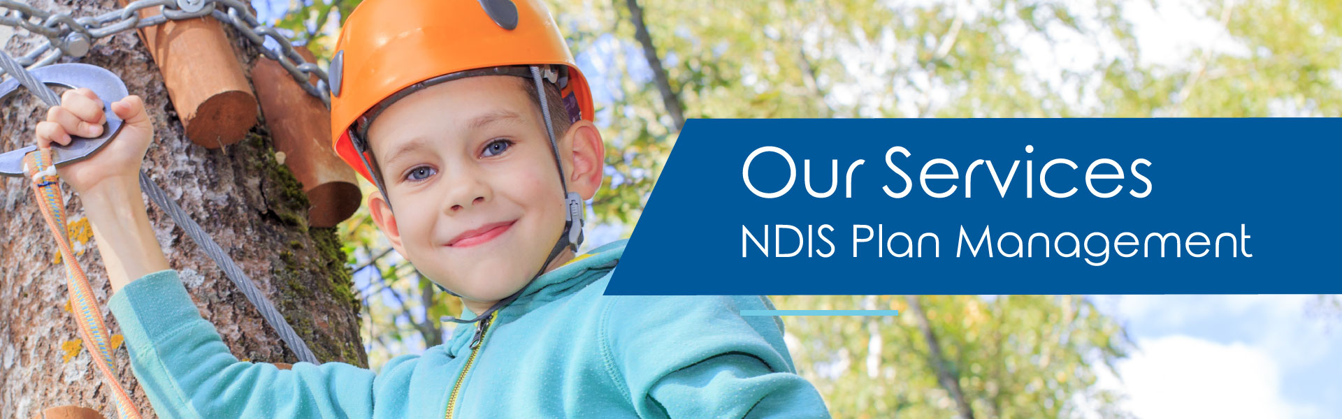 NDIS participant engaged in outdoors activites and climbing a tree, wearing safety gear.
